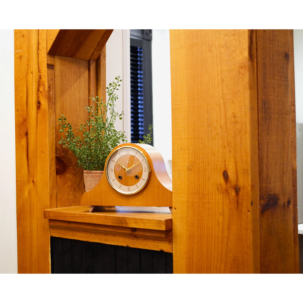 Hermle Carole Mechanical Mantel Clock in light cherry in interior design - Premier Clocks