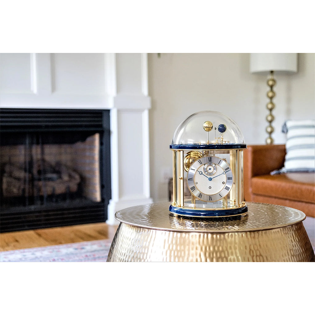 Hermle Tellurium Mantel Clock in Blue/Brass in interior decor - Premier Clocks