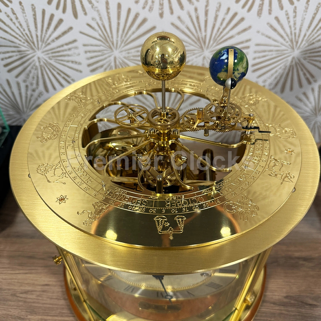 Hermle Tellurium Mantel Clock in Light Cherry miniature planetarium - Premier Clocks