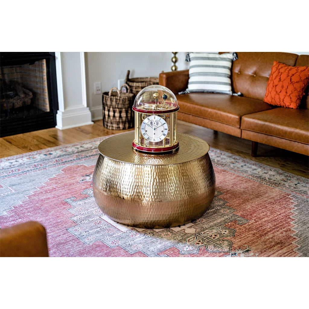 Hermle Tellurium Mantel Clock in Red/Brass in interior decor - Premier Clocks