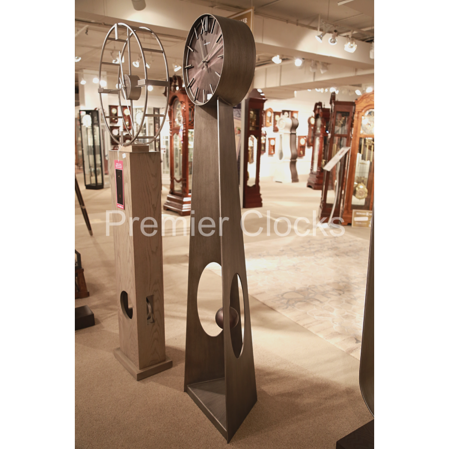 Howard Miller Odie Floor Clock 615114 real photo angle in a showroom - Premier Clocks