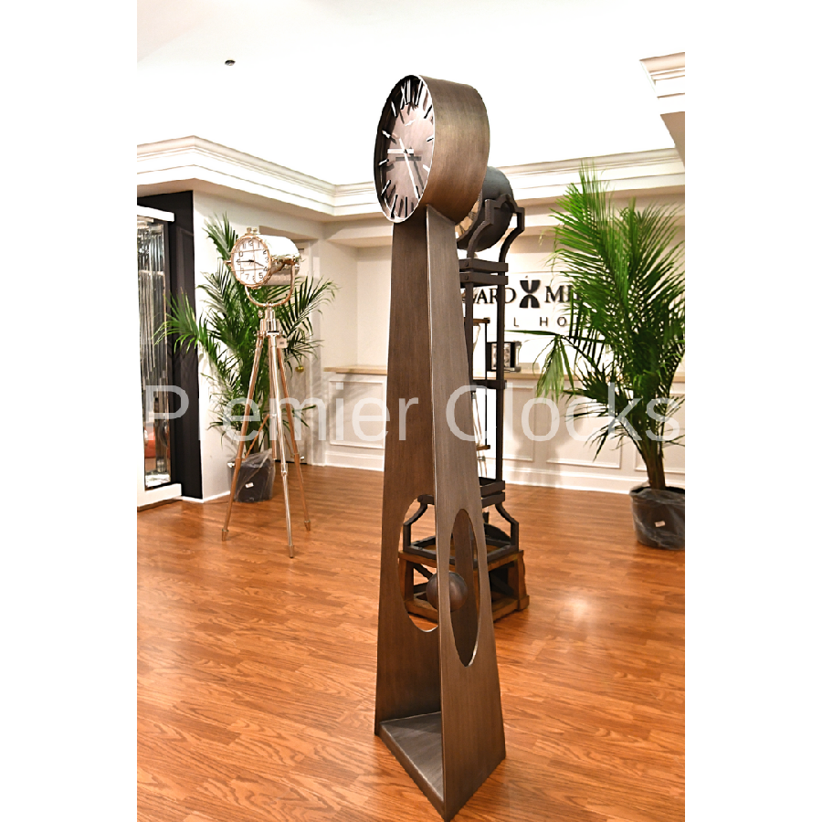 Howard Miller Odie Floor Clock 615114 real photo in interior decor in a showroom - Premier Clocks