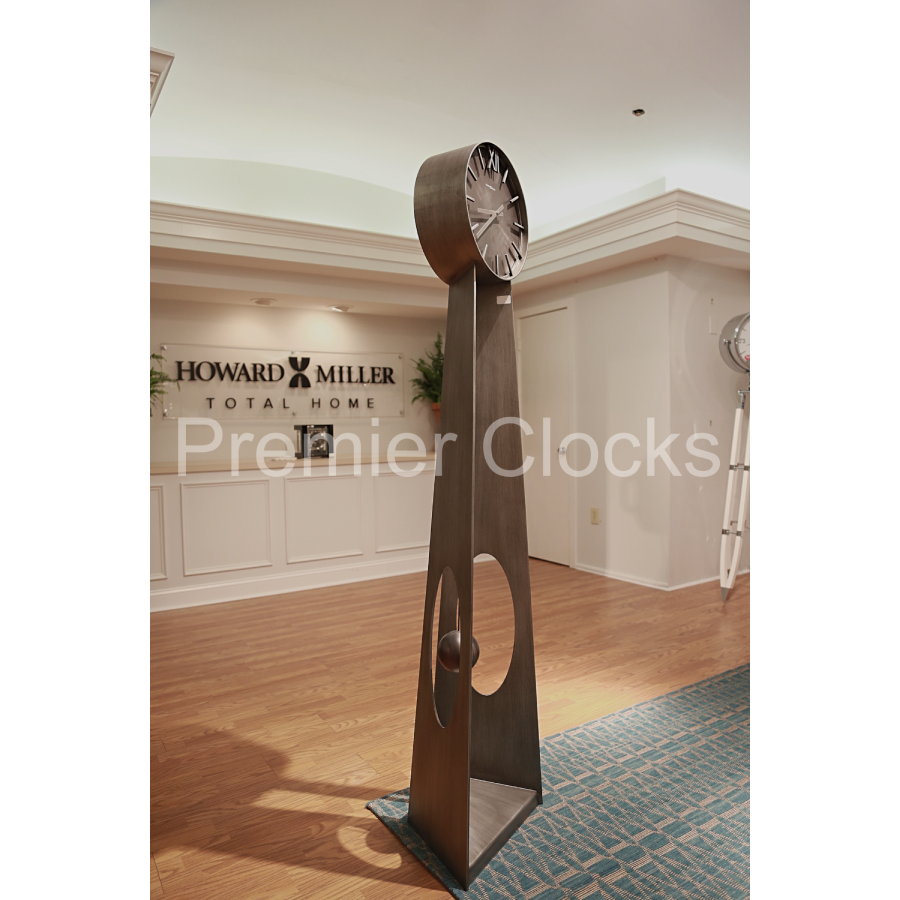 Howard Miller Odie Floor Clock 615114 real photo side in interior decor of a showroom - Premier Clocks